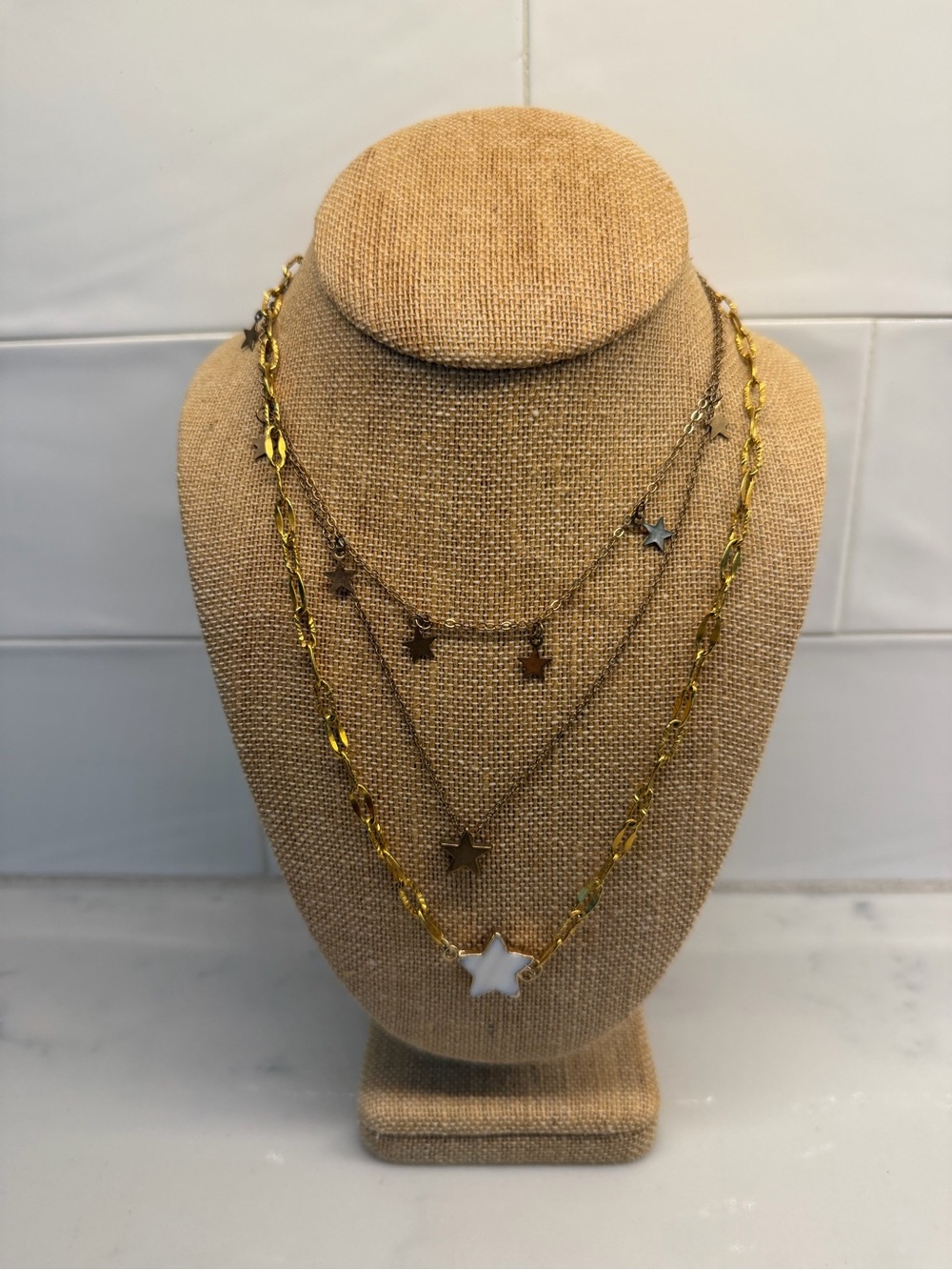 Layered Gold Star Necklace with White Star Pendant